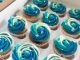 12 cup cakes met blauwe boter crème