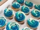 12 cup cakes met blauwe boter crème